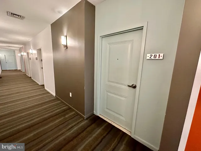 a bathroom with a sink and a shower