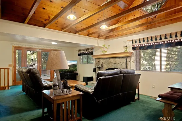 a view of a livingroom with furniture and window