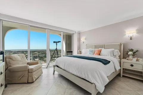 a bed room with a bed and a couch