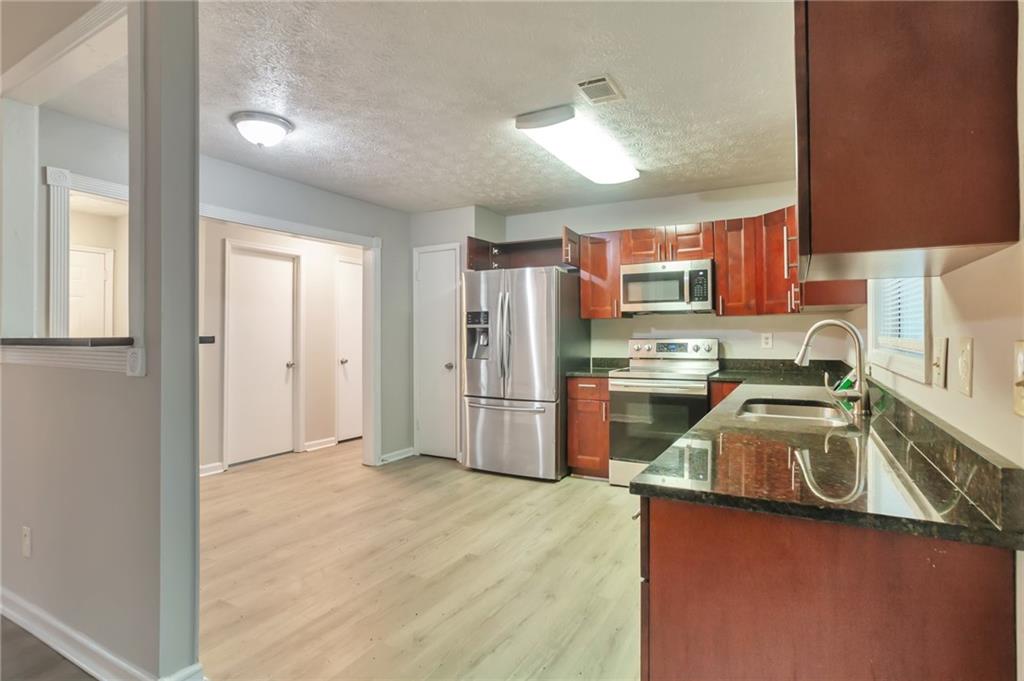 5577 Whittondale Road Lithonia, GA 30058 - Photo 7 of 24