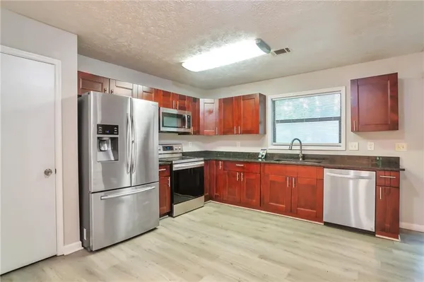 $235,000 | 5577 Whittondale Road, Lithonia, GA 30058