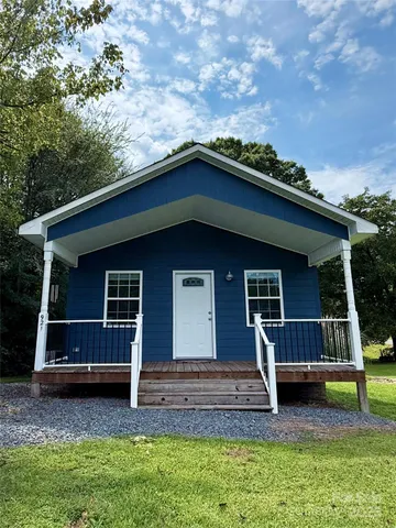 a house view with a garden space
