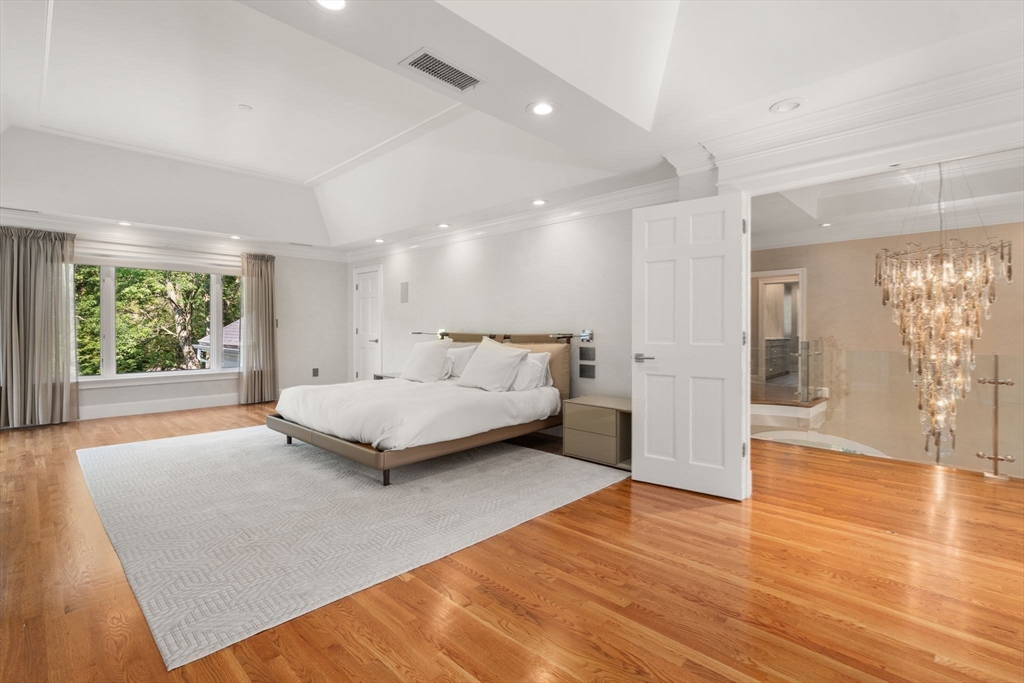 69 Princeton Road Brookline, MA 02467 - Photo 17 of 28 a living room with furniture and a large window