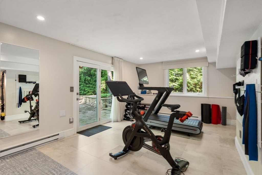 69 Princeton Road Brookline, MA 02467 - Photo 27 of 28 a view of a workspace with furniture and a window
