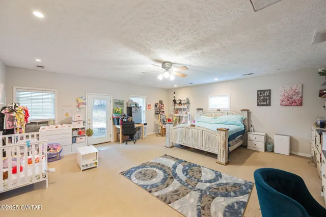 a bed room with furniture and a couch