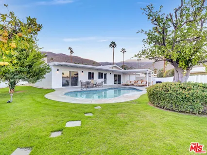a view of a house with a swimming pool