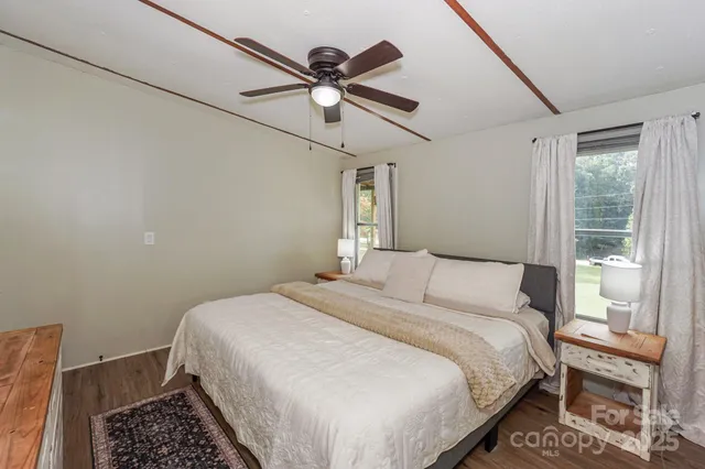 a bedroom with a bed and a closet