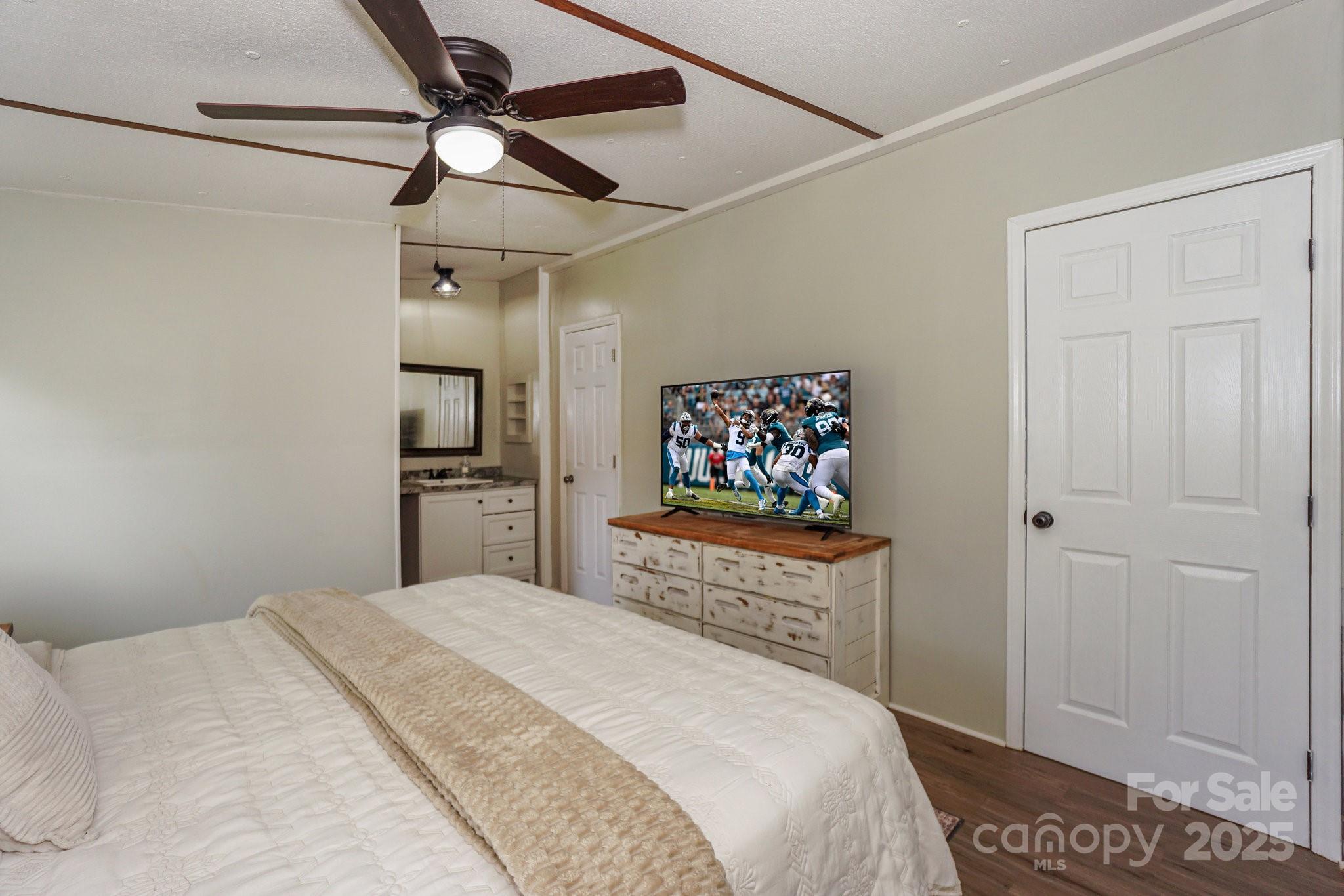 1279 Craig Drive Iron Station, NC 28080 - Photo 24 of 47 a bedroom with a bed and a closet