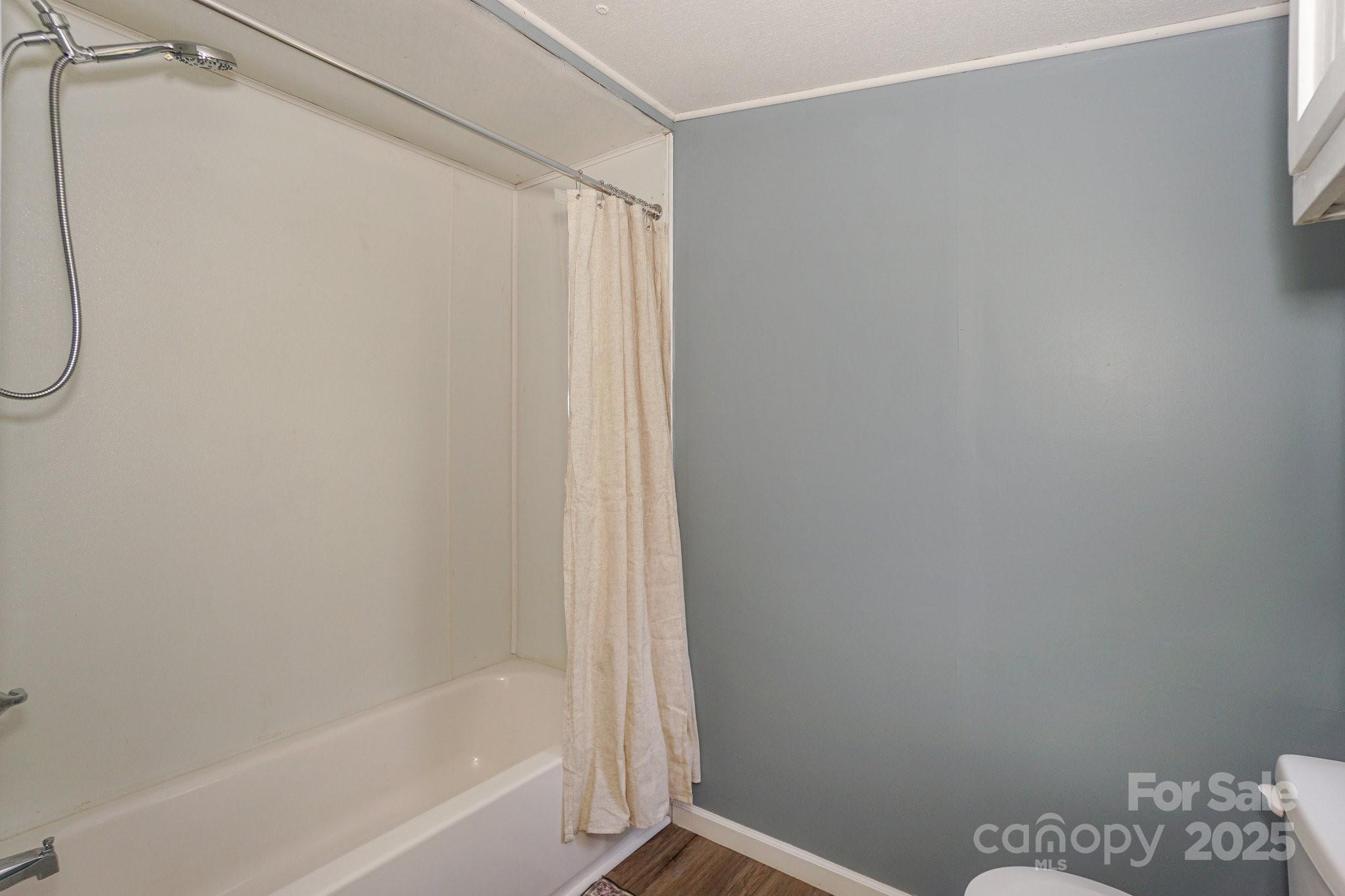 1279 Craig Drive Iron Station, NC 28080 - Photo 33 of 47 a bathroom with a bathtub