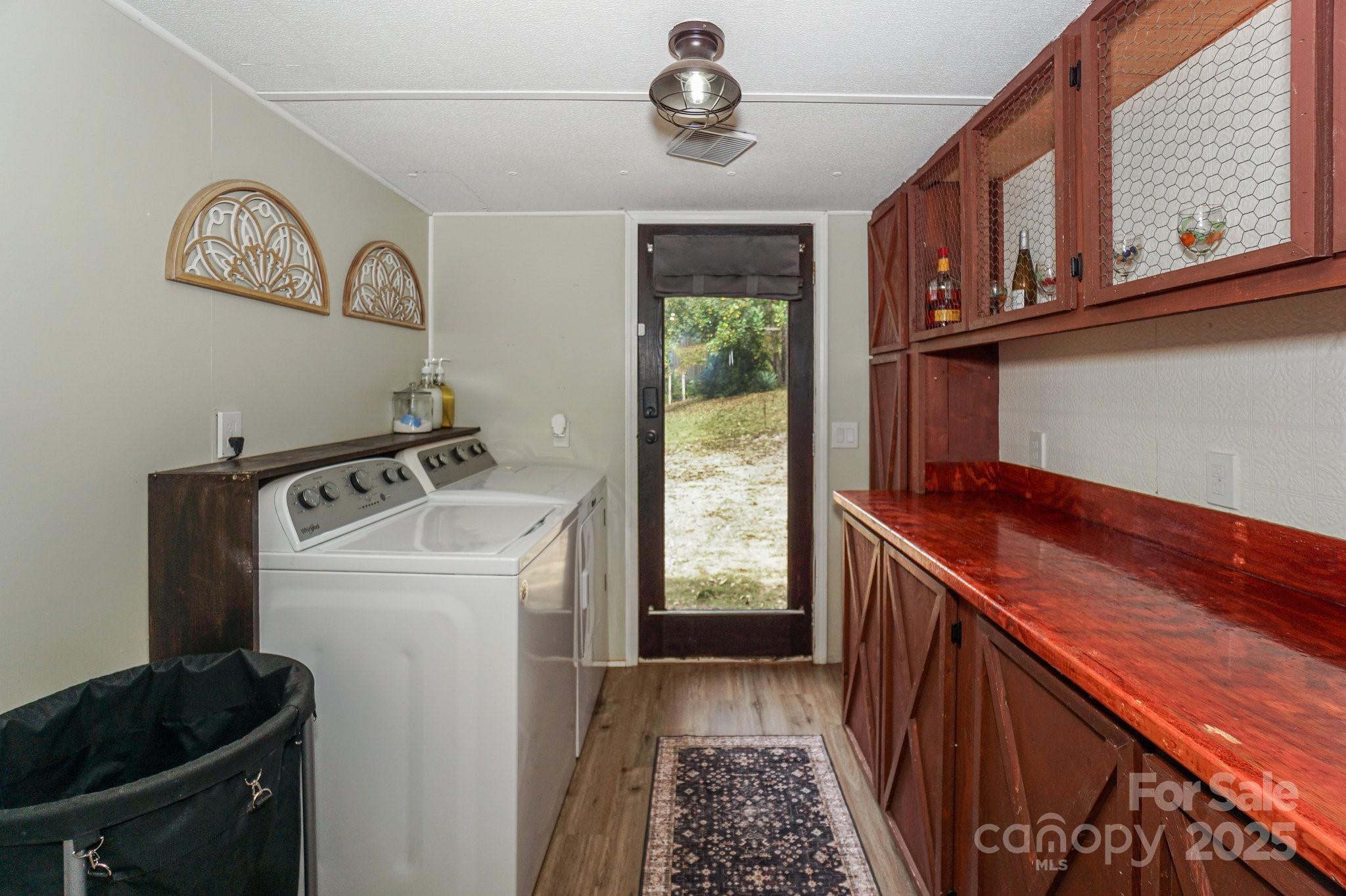 1279 Craig Drive Iron Station, NC 28080 - Photo 36 of 47 a utility room with dryer and washer