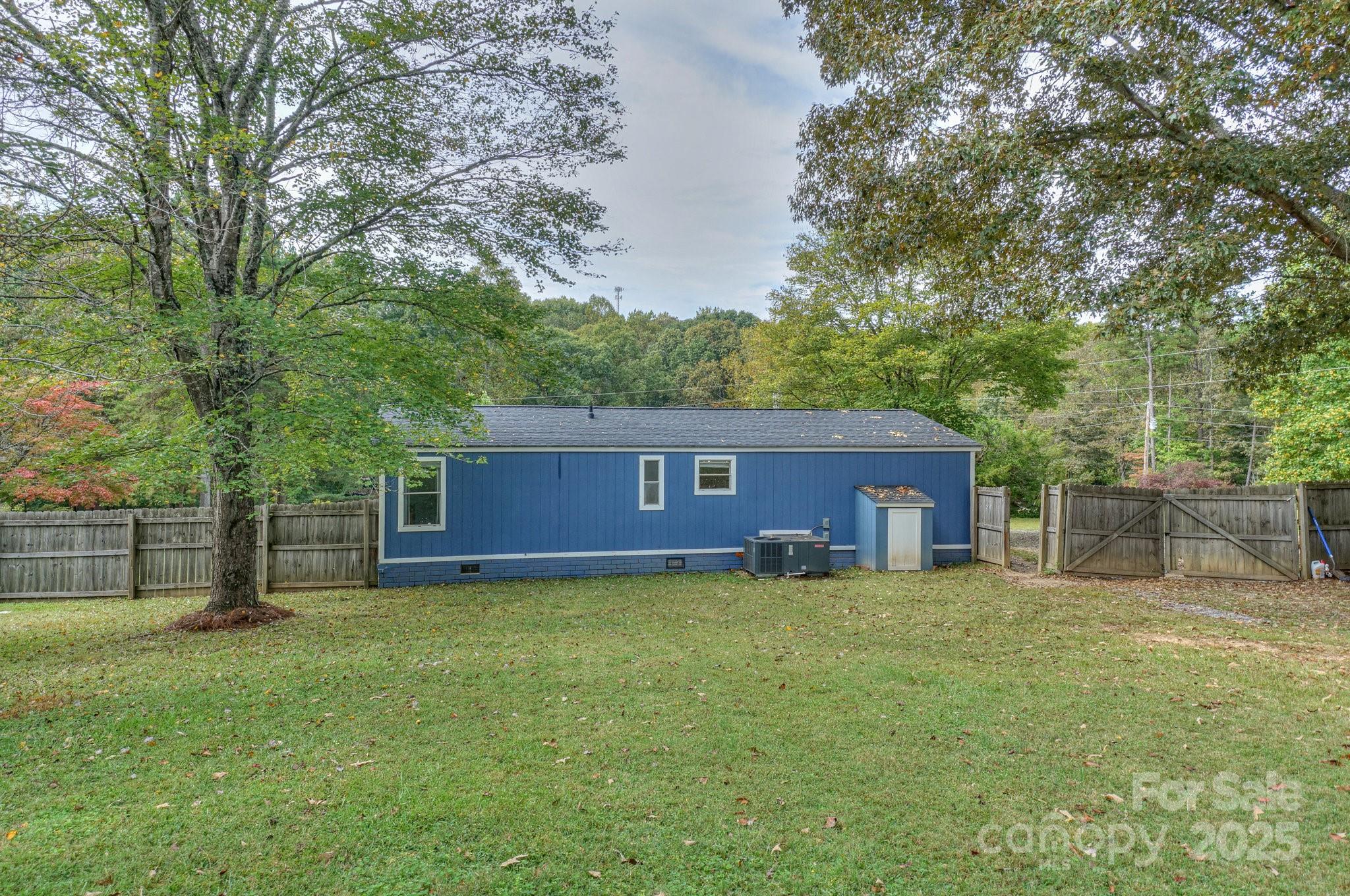 1279 Craig Drive Iron Station, NC 28080 - Photo 41 of 47 a view of a house with a yard