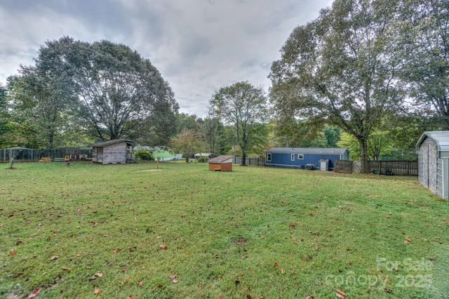 a backyard of a house with lots of green space