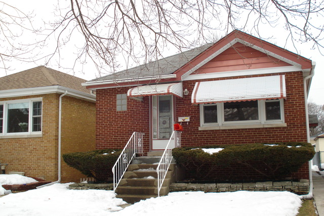 2427 Keystone Avenue North Riverside, IL 60546 - Photo 1 of 14 a front view of a house with a yard