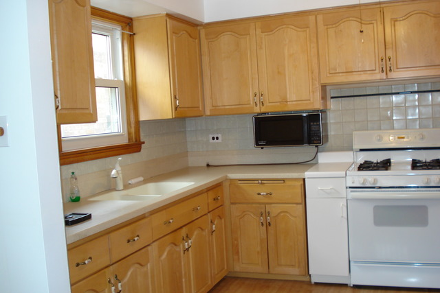 2427 Keystone Avenue North Riverside, IL 60546 - Photo 3 of 14 a kitchen with granite countertop white cabinets and white appliances