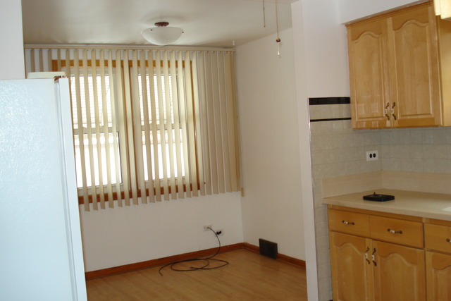 2427 Keystone Avenue North Riverside, IL 60546 - Photo 6 of 14 a view of an empty room with a window