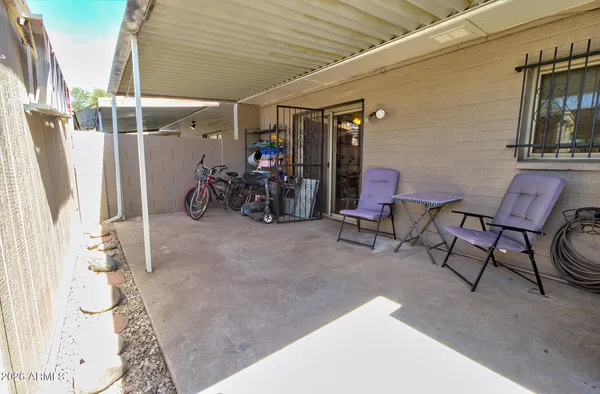 a house with a trees in front of it