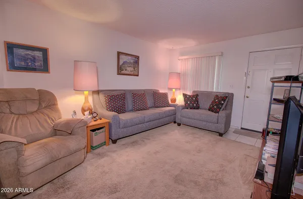 a living room with furniture and a couch