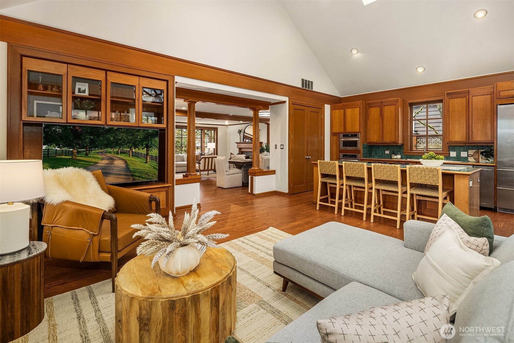 7016 28th Avenue Northeast Seattle, WA 98115 - Photo 13 of 32 a living room with furniture and a floor to ceiling window