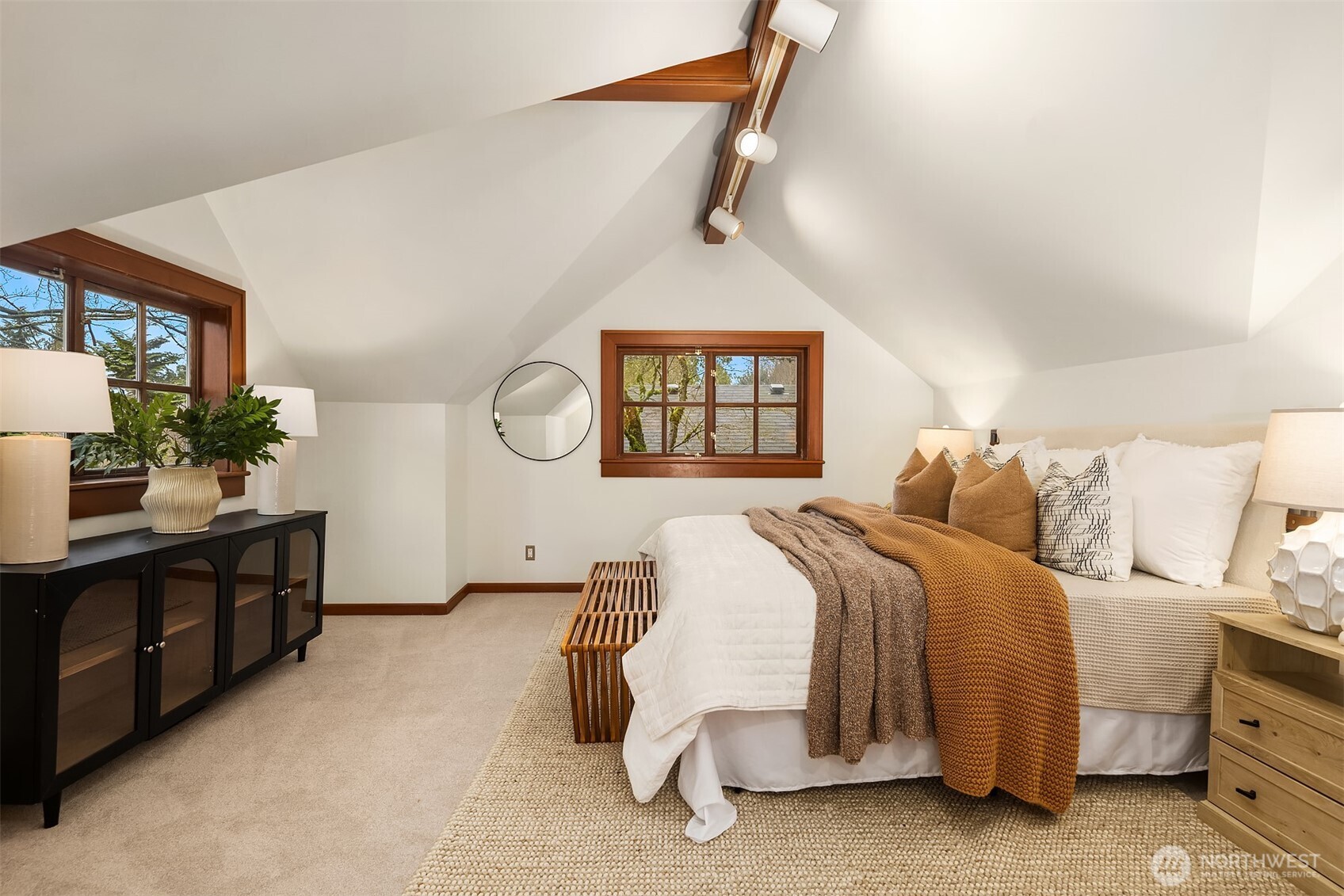 7016 28th Avenue Northeast Seattle, WA 98115 - Photo 15 of 32 a bed room with a bed window and a mirror