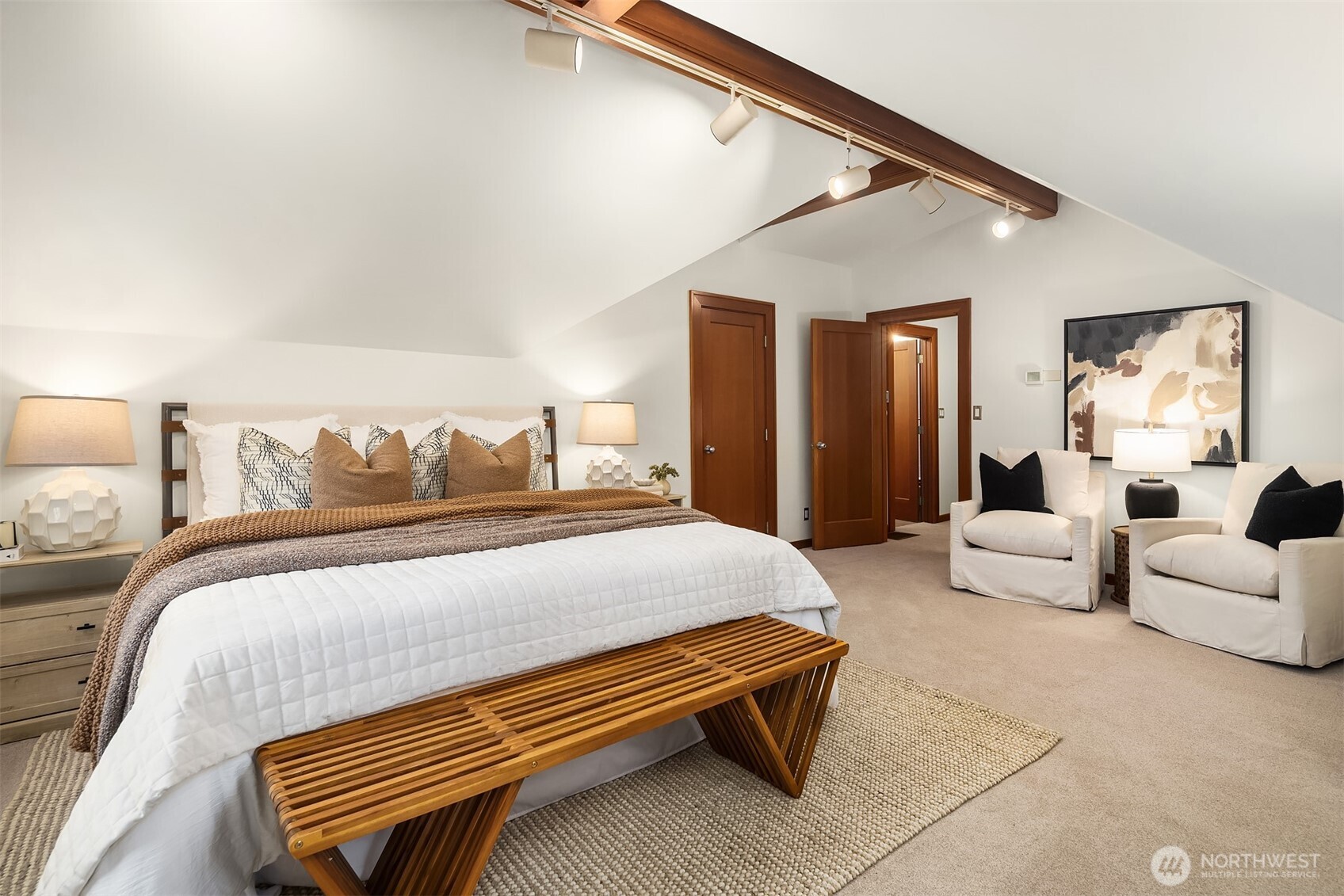 7016 28th Avenue Northeast Seattle, WA 98115 - Photo 16 of 32 a bedroom with furniture and a couch