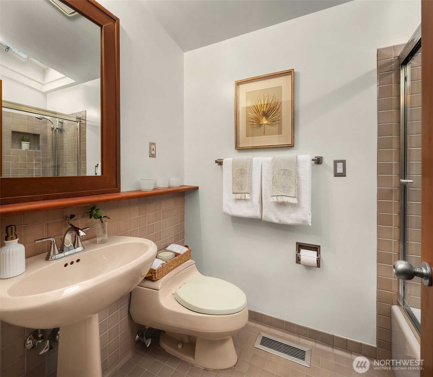 7016 28th Avenue Northeast Seattle, WA 98115 - Photo 17 of 32 a bathroom with a toilet sink and mirror