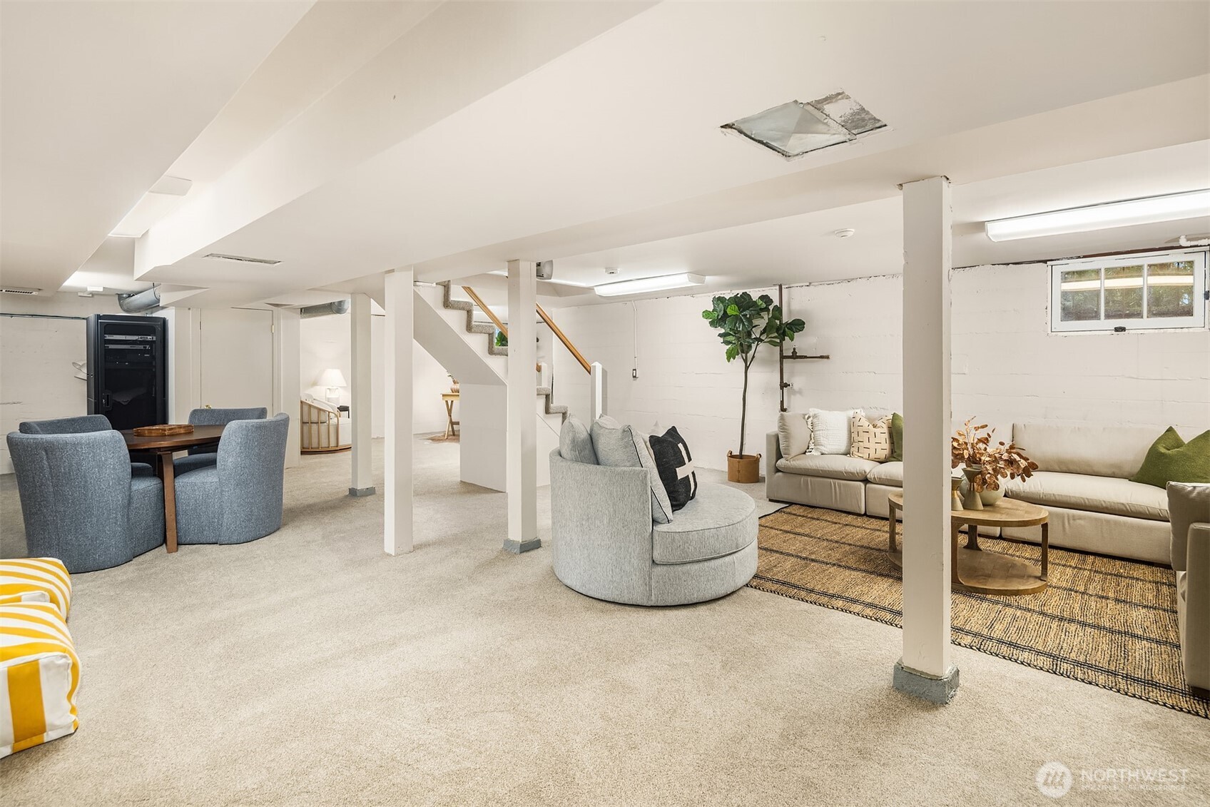 7016 28th Avenue Northeast Seattle, WA 98115 - Photo 23 of 32 a living room with furniture and a flat screen tv
