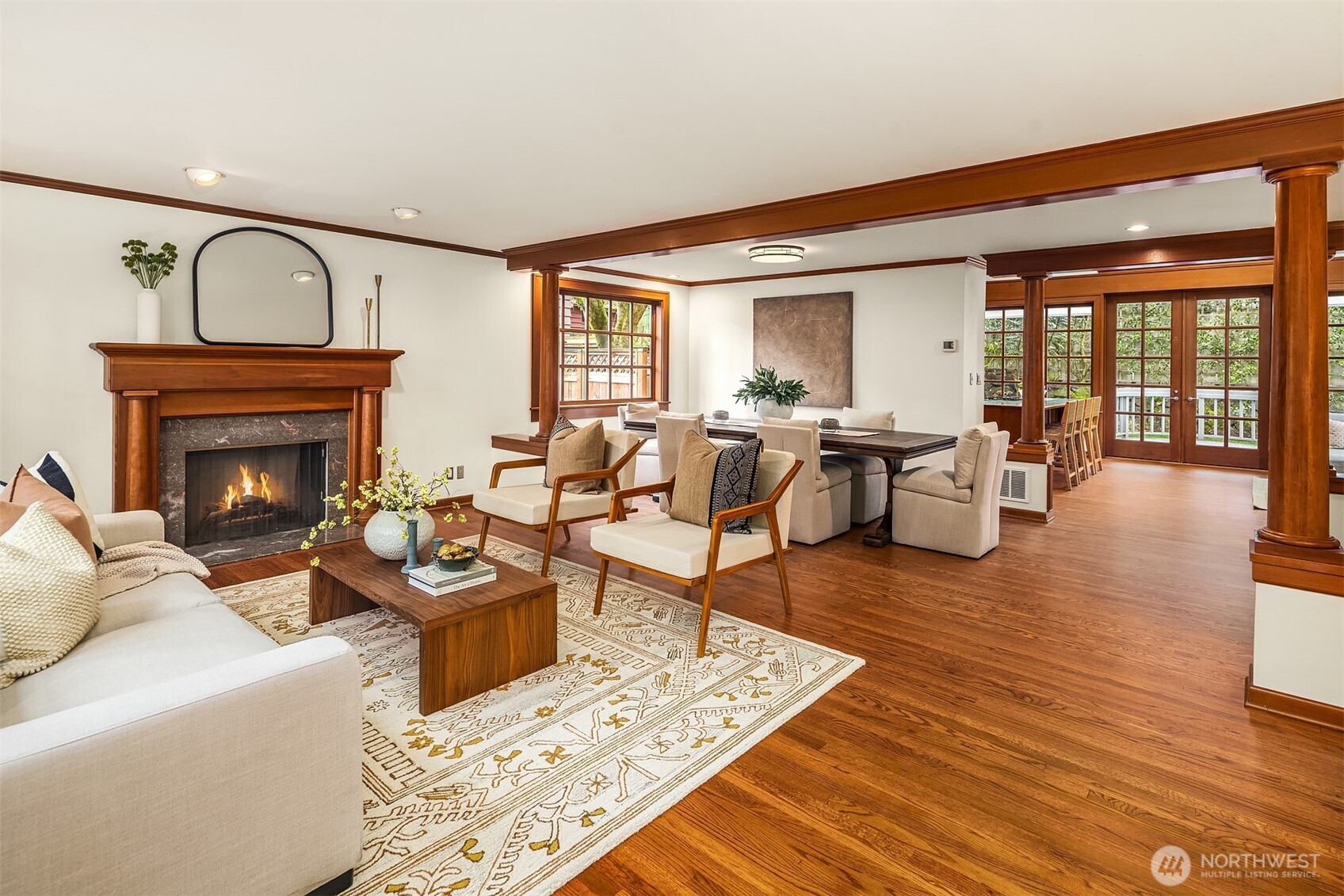7016 28th Avenue Northeast Seattle, WA 98115 - Photo 3 of 32 a living room with furniture wooden floor and a fireplace