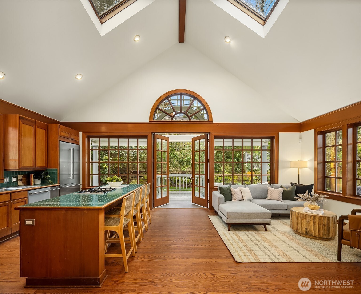 7016 28th Avenue Northeast Seattle, WA 98115 - Photo 8 of 32 a living room with furniture fireplace and a large window