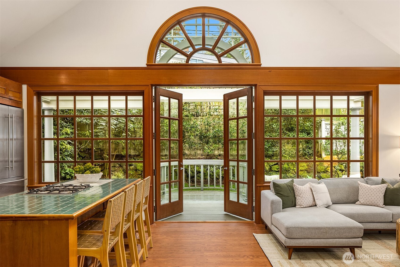 7016 28th Avenue Northeast Seattle, WA 98115 - Photo 10 of 32 a living room with furniture and a large window