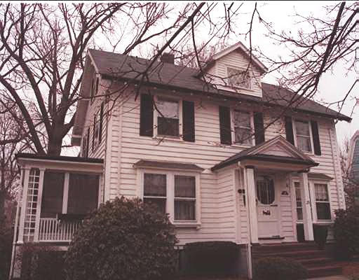 25 Newton Road Medford, MA 02155 - Photo 1 of 1 a front view of a house with a tree