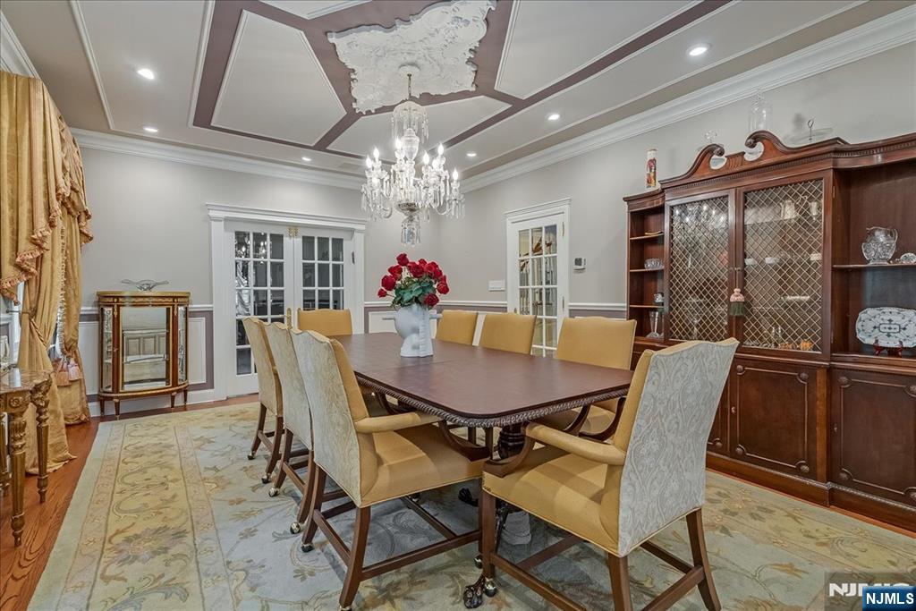 294 Oakwood Road Englewood, NJ 07631 - Photo 11 of 50 a view of a dining room with furniture window and wooden floor