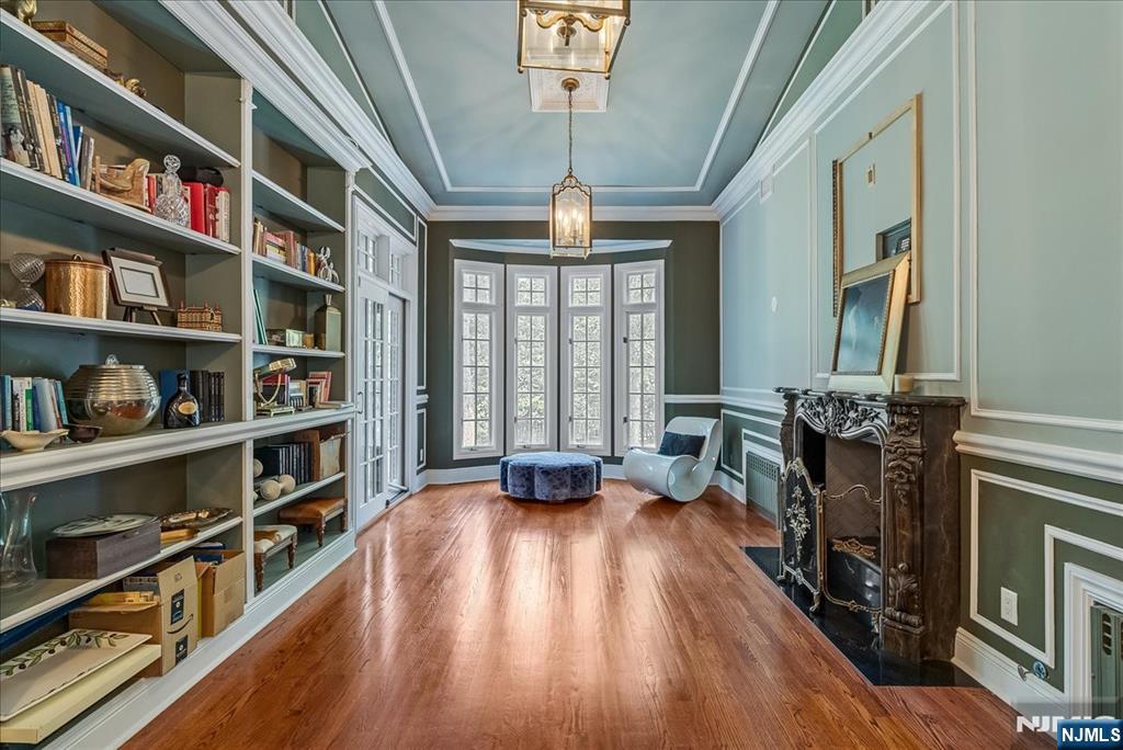 294 Oakwood Road Englewood, NJ 07631 - Photo 20 of 50 a living room with hard wood floors and a window