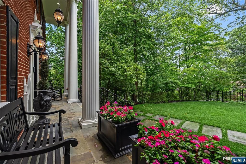 294 Oakwood Road Englewood, NJ 07631 - Photo 2 of 50 a view of a potted flower in a yard of a house
