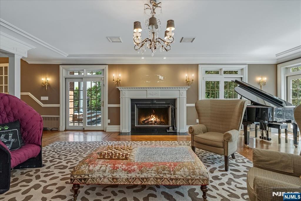 294 Oakwood Road Englewood, NJ 07631 - Photo 22 of 50 a living room with furniture and a fireplace