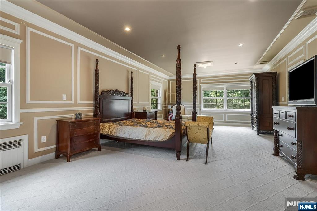 294 Oakwood Road Englewood, NJ 07631 - Photo 24 of 50 a bedroom with furniture and a window