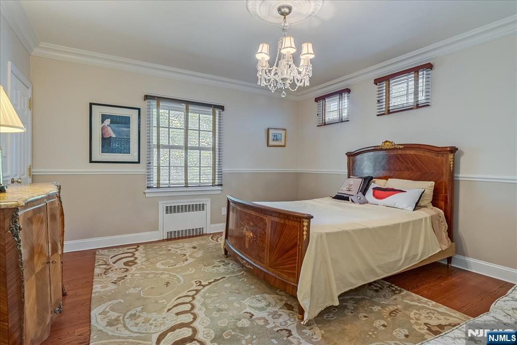 294 Oakwood Road Englewood, NJ 07631 - Photo 26 of 50 a bedroom with a bed and a window