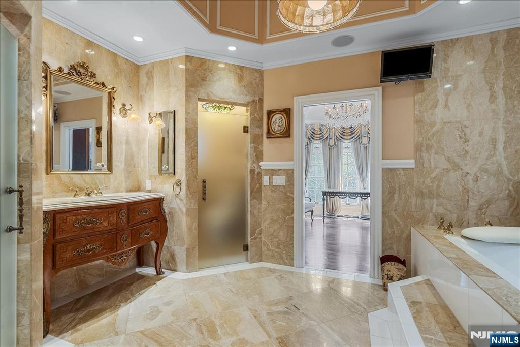 294 Oakwood Road Englewood, NJ 07631 - Photo 36 of 50 a bathroom with a sink a toilet and shower