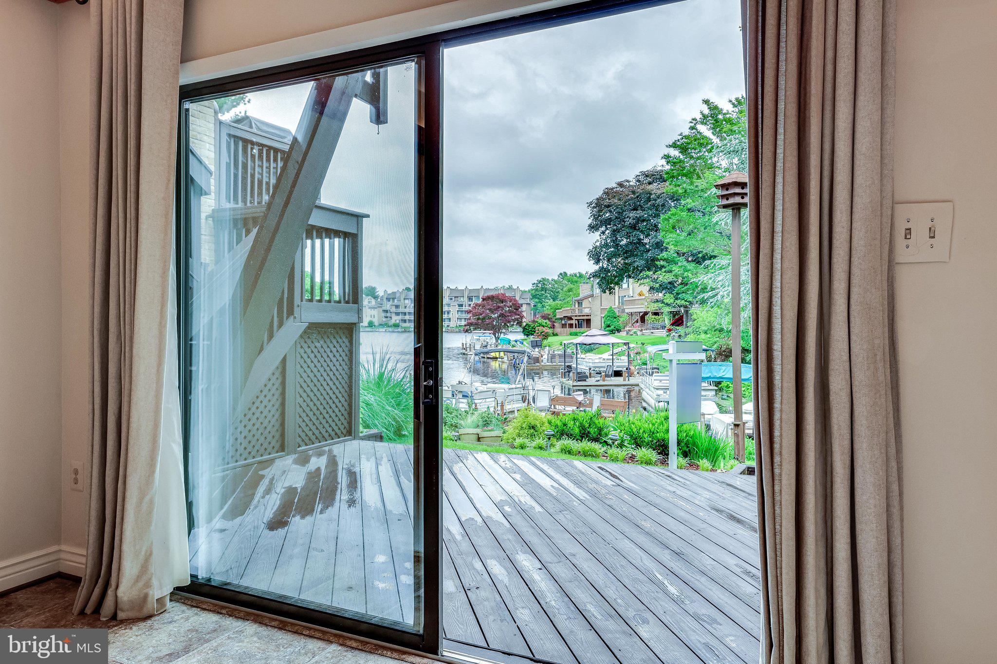 2024 Lakebreeze Way Reston, VA 20191 - Photo 67 of 95 Sliding door from the rec room leads to the deck.