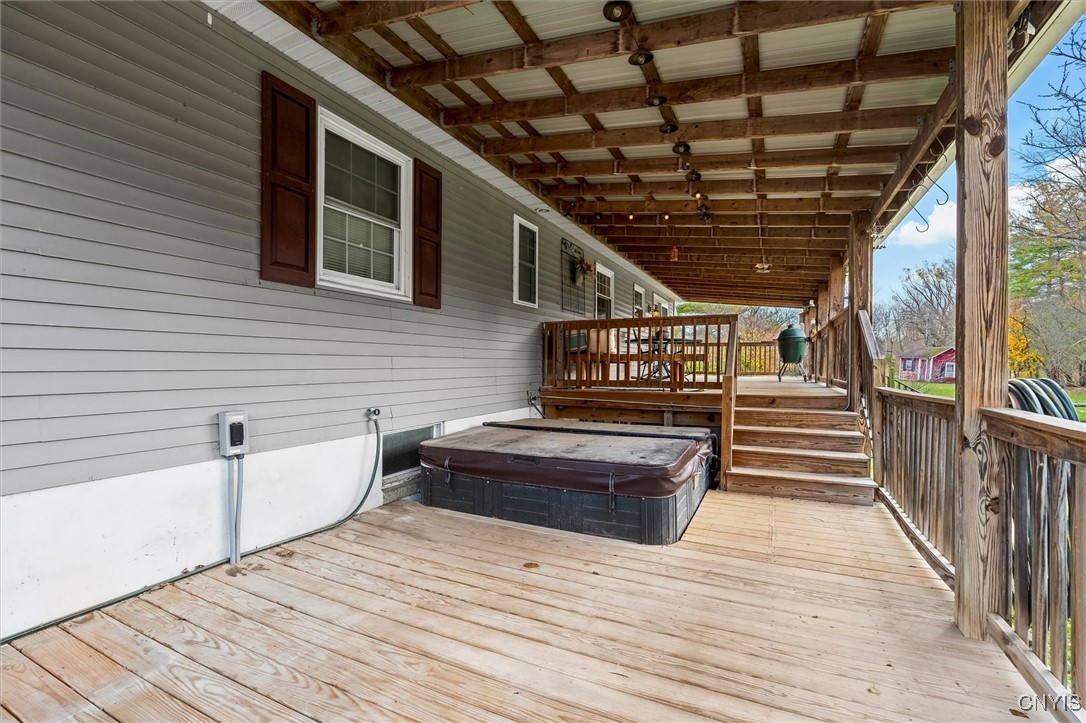 892 Clark Street Road Aurelius, NY 13021 - Photo 31 of 41 Lower Deck With Hot Tub