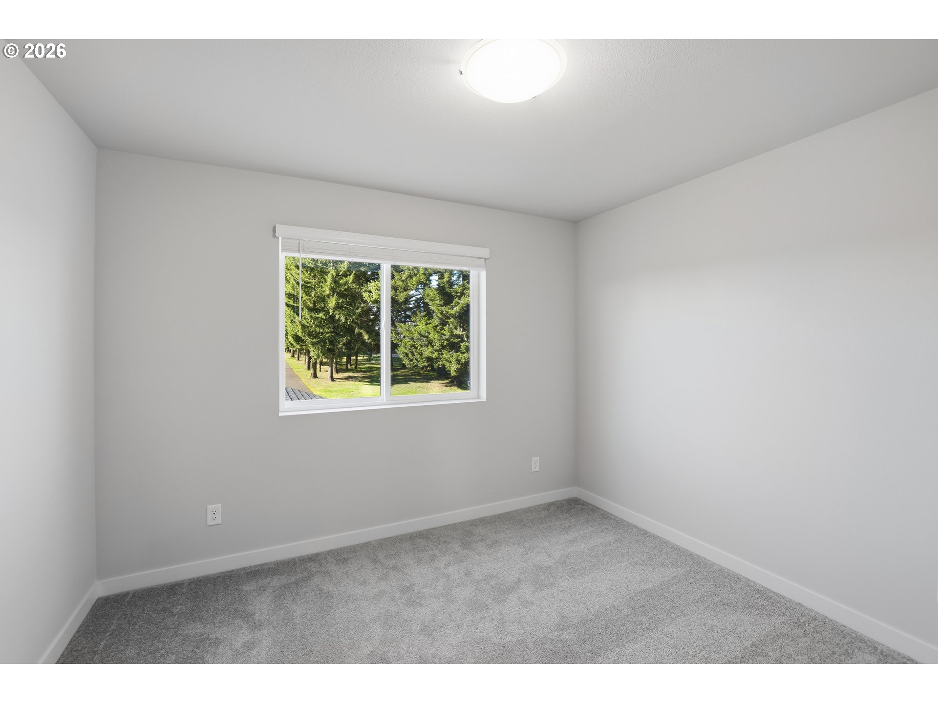23045 Southwest 89th Avenue Tualatin, OR 97062 - Photo 19 of 19 an empty room with a window