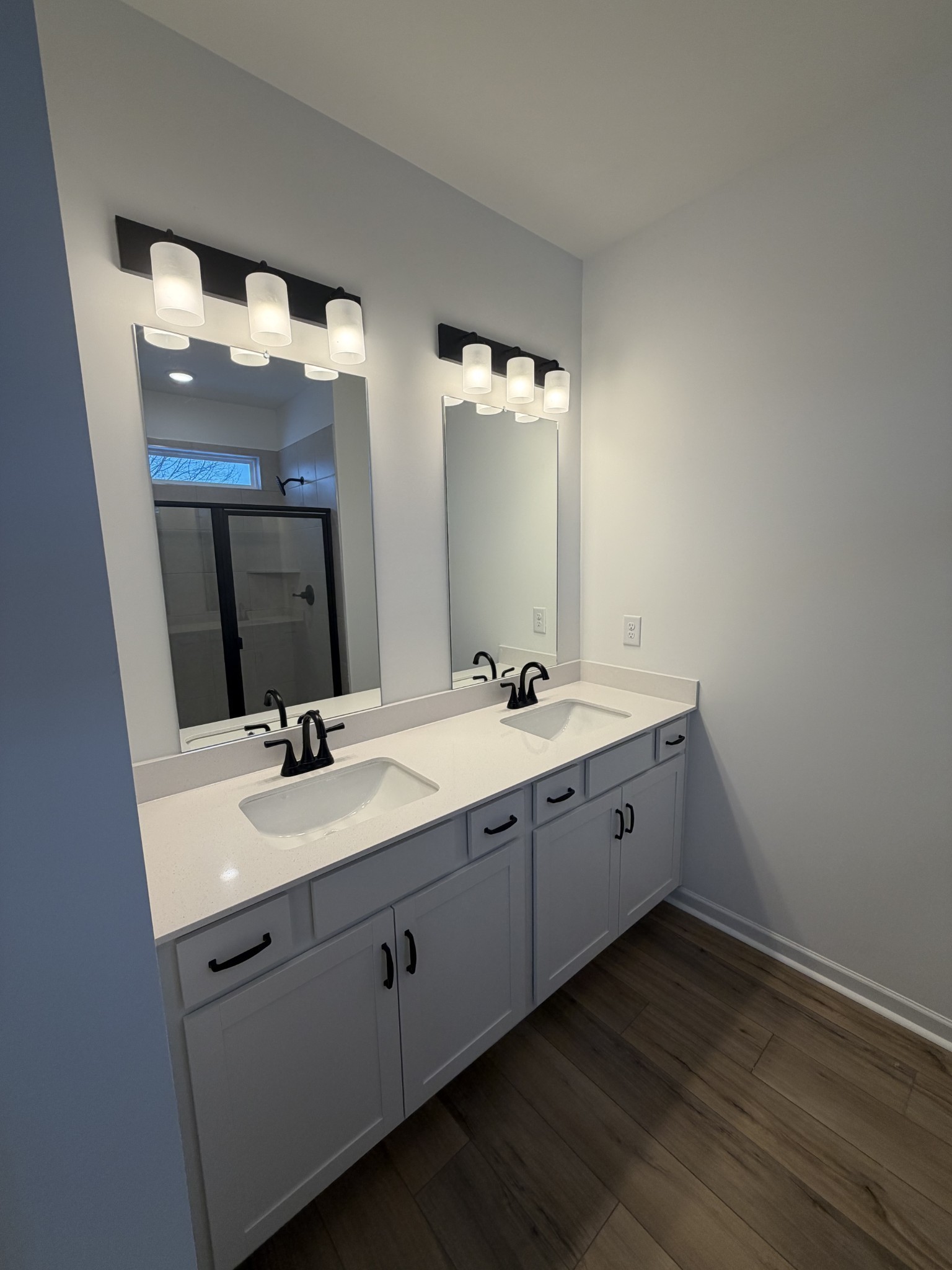 119 Yarrow Loop Clarksville, TN 37043 - Photo 14 of 25 a spacious bathroom with double vanity and a mirror