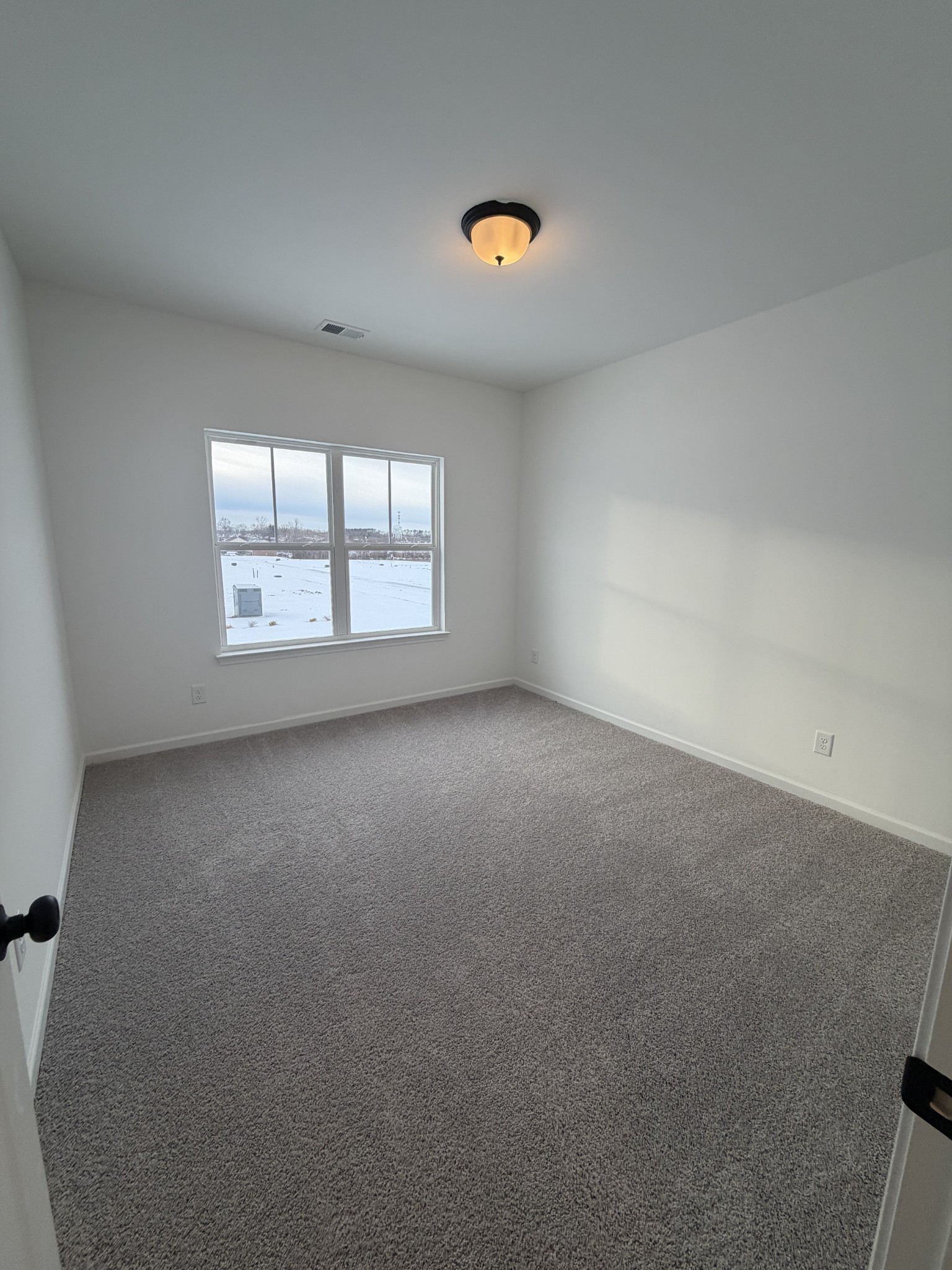 119 Yarrow Loop Clarksville, TN 37043 - Photo 19 of 25 an empty room with a window