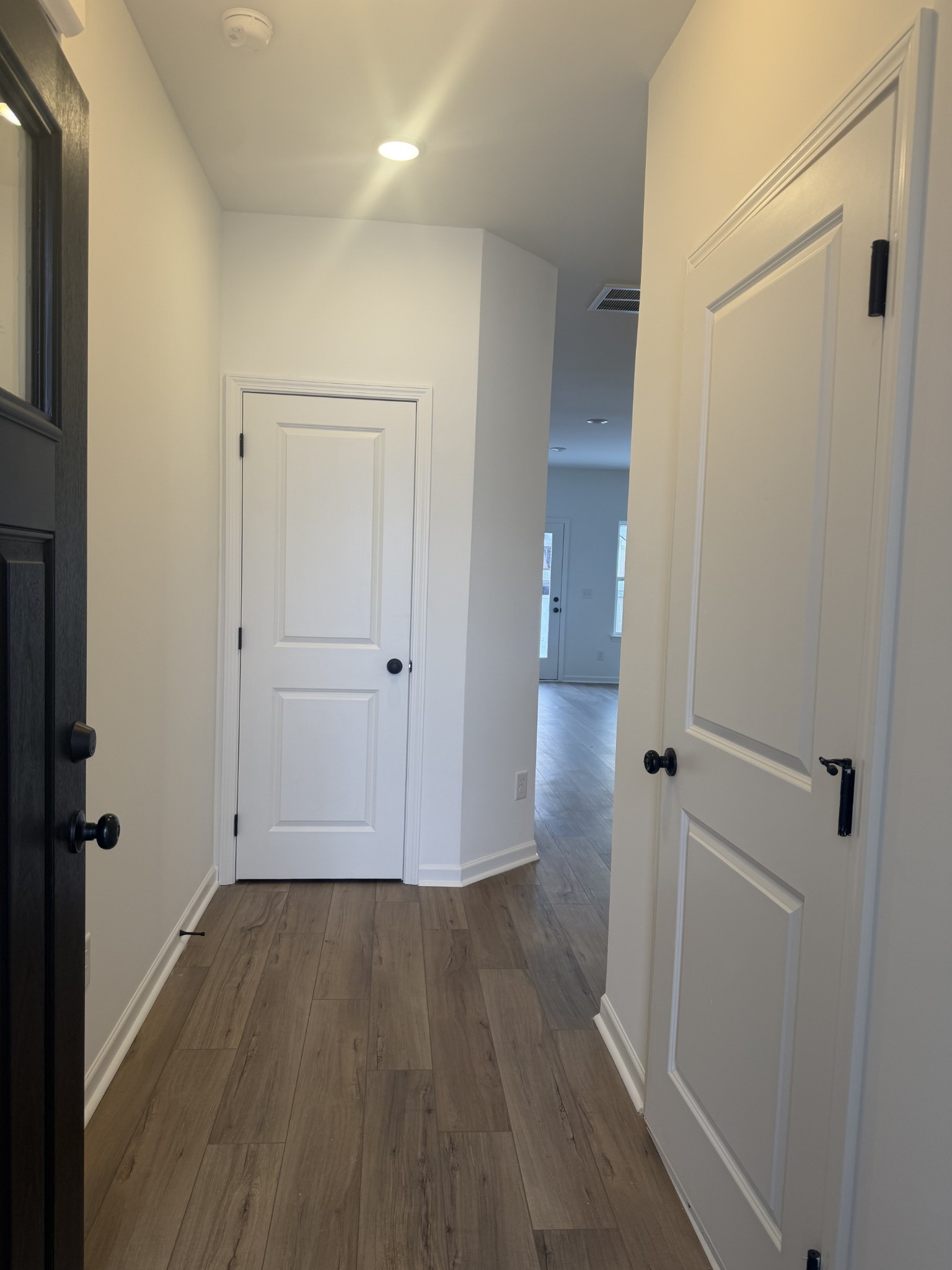 119 Yarrow Loop Clarksville, TN 37043 - Photo 2 of 25 a view of a hallway with wooden floor