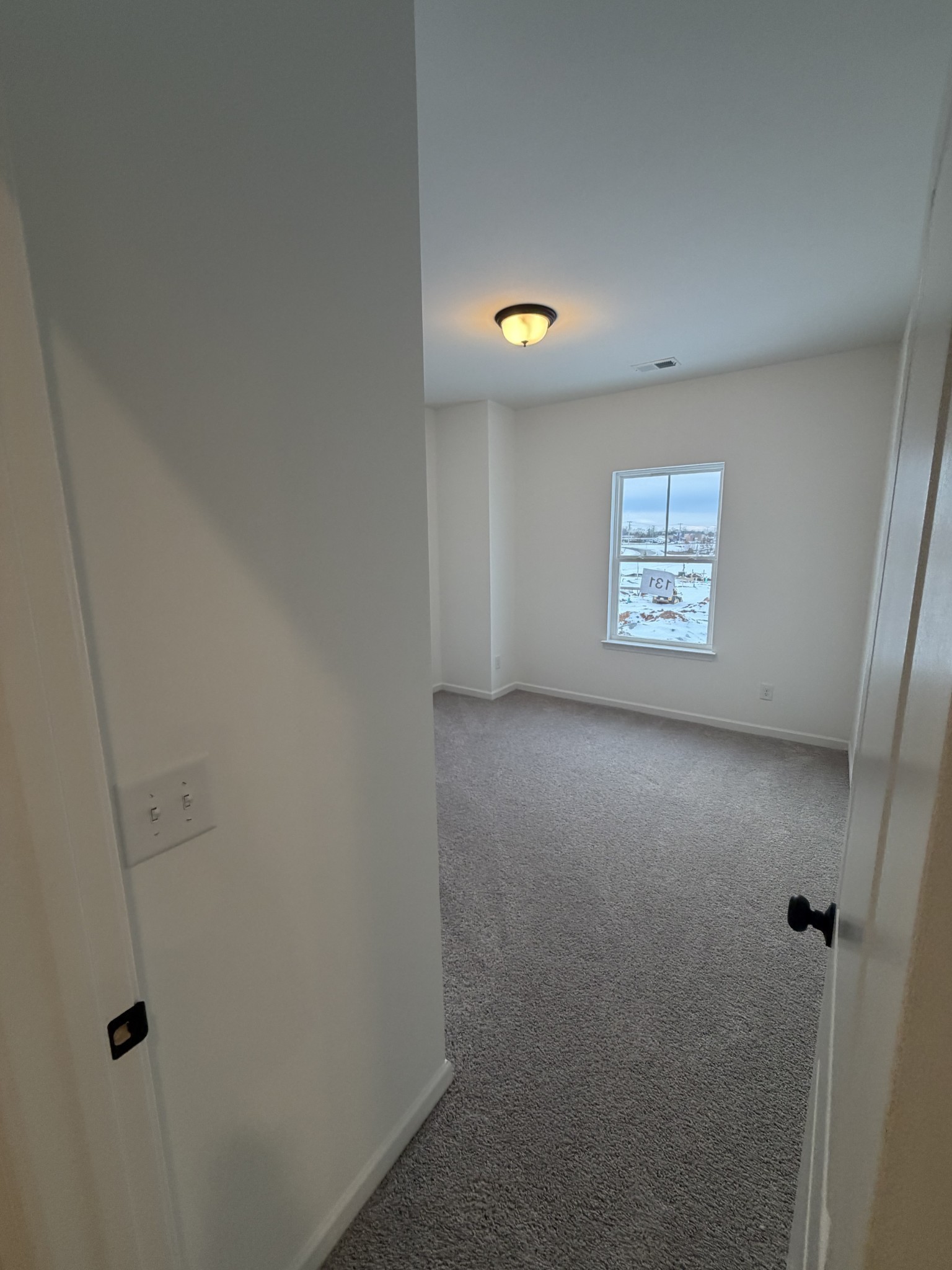 119 Yarrow Loop Clarksville, TN 37043 - Photo 22 of 25 a view of an empty room with a window