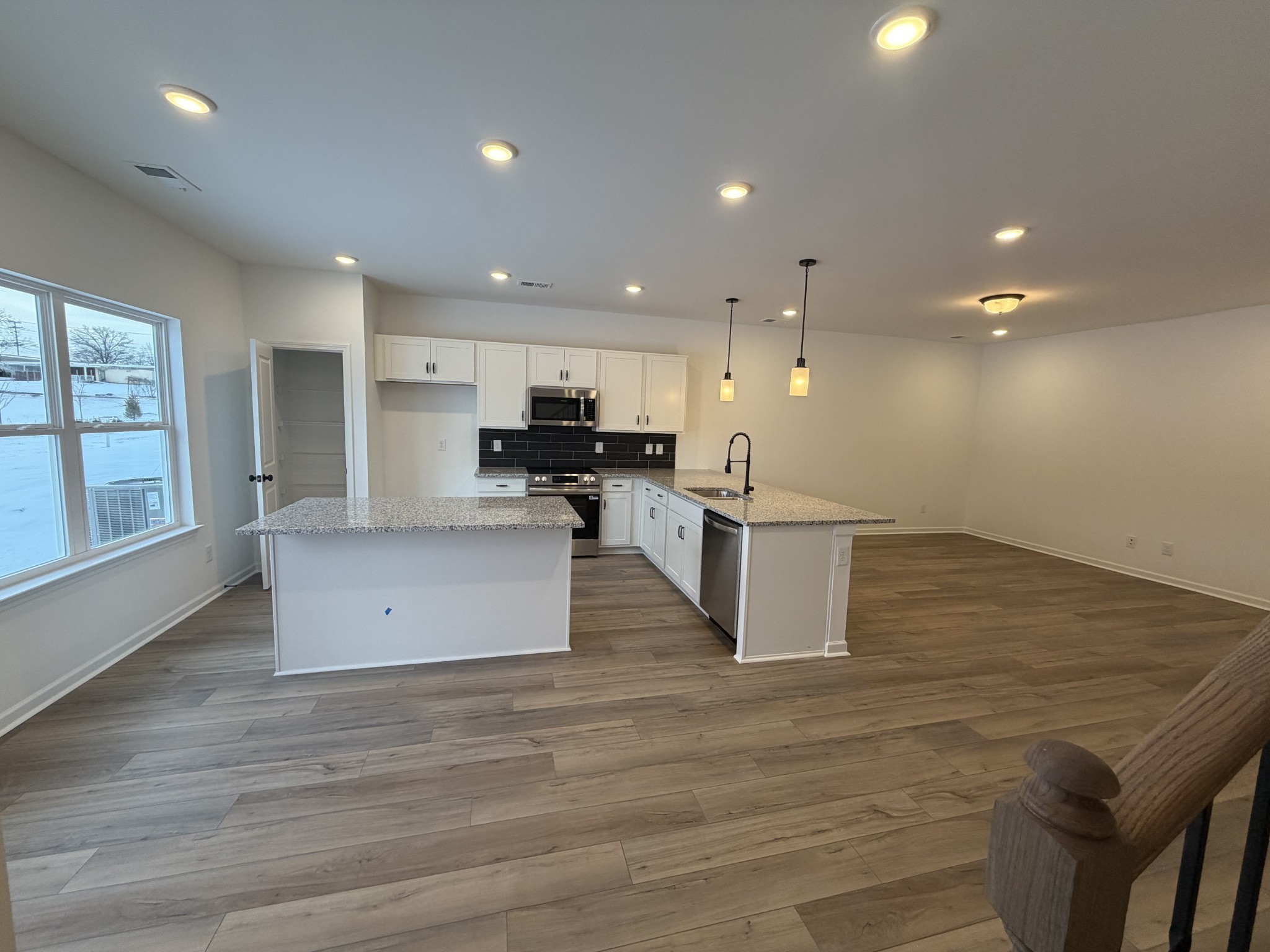 119 Yarrow Loop Clarksville, TN 37043 - Photo 5 of 25 a view of kitchen view with wooden floor and electronic appliances