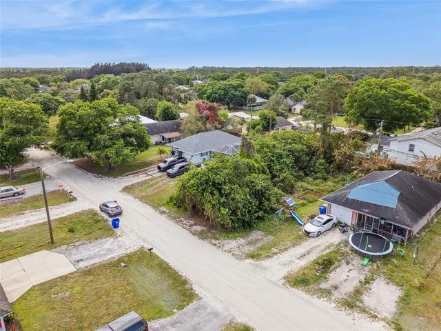 a view of a swimming pool with lounge chair