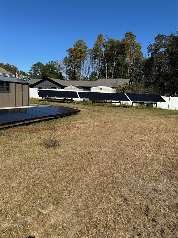 6848 Copperfield Drive New Port Richey, FL 34655 - Photo 16 of 20 a view of a lake with houses