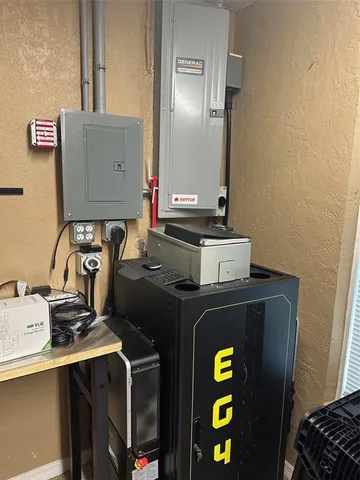 a view of storage and utility room with washer and dryer