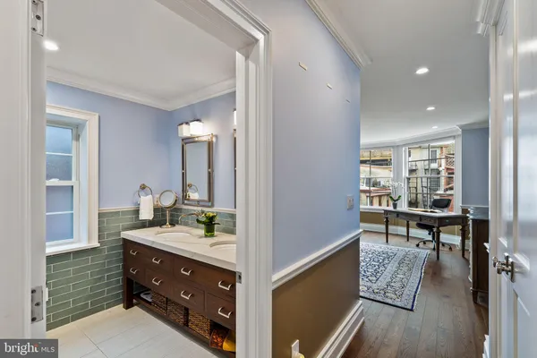 a bathroom with a toilet a sink and shower
