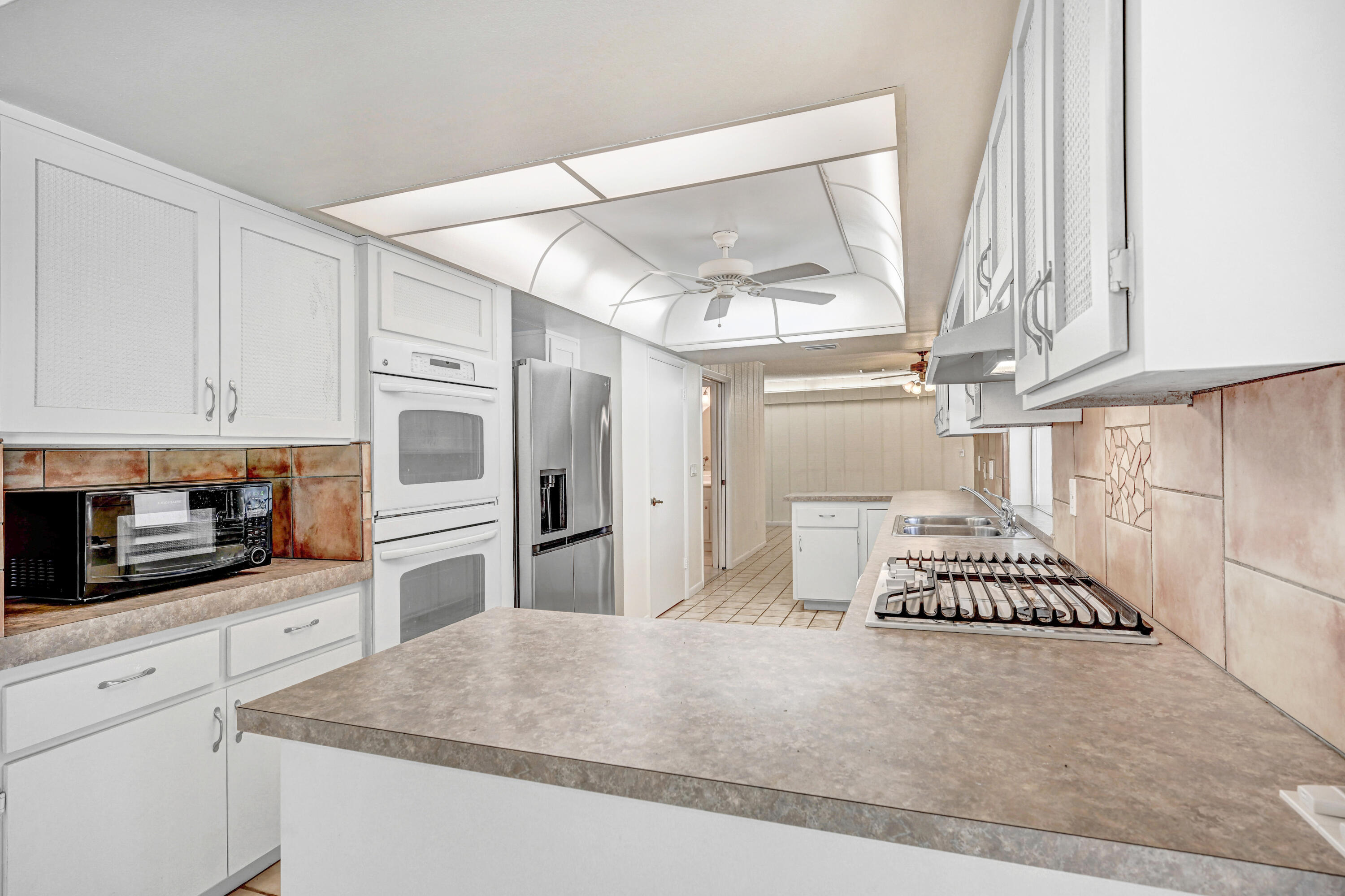 675 Caribbean Road Satellite Beach, FL 32937 - Photo 11 of 35 Double Ovens & Gas Cooktop